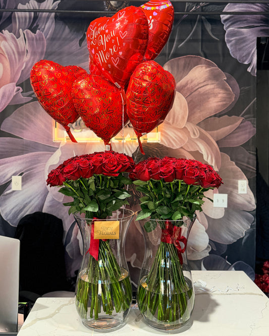 The Grand Gesture 50 long stem roses in clear glass vase with heart balloons by Rich Florals, Woodbridge NJ
